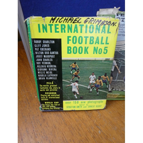 671 - A lot of vintage football annuals and books and a Sun Newspaper Soccercard no 262 Harry Gregg.