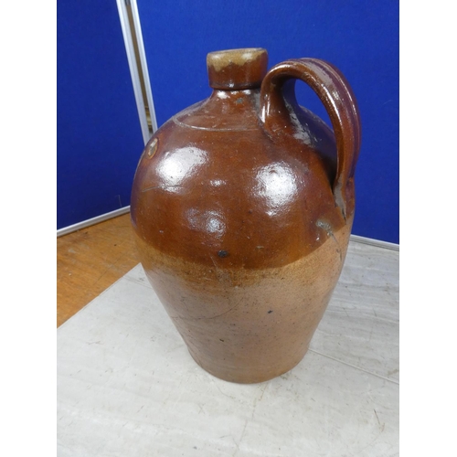 680 - An antique stoneware flagon.