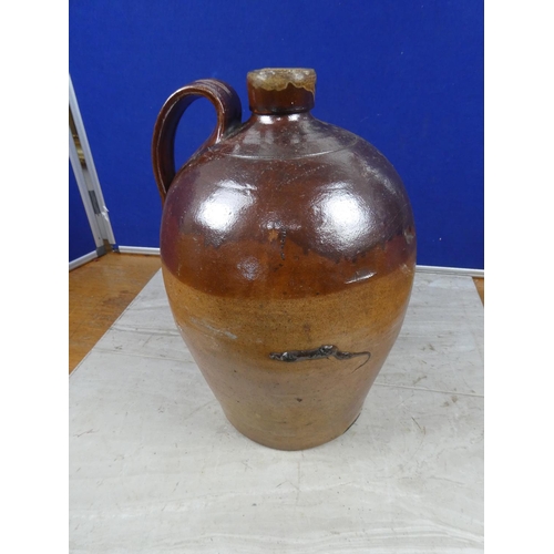 680 - An antique stoneware flagon.