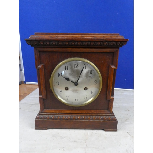 686 - A stunning antique oak cased mantle clock