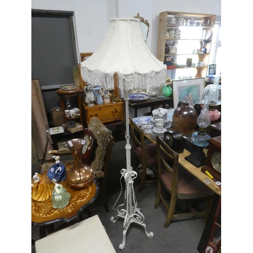 690 - An antique style standard lamp base and shade.