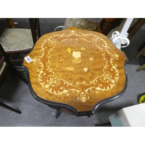 695 - A decorative topped occasional table with undershelf.