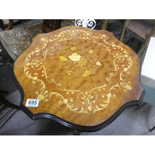 695 - A decorative topped occasional table with undershelf.