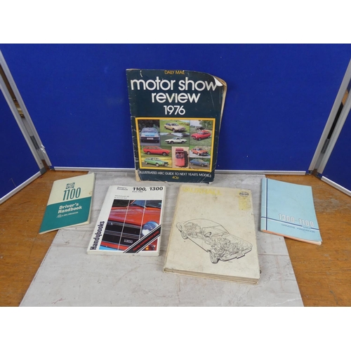 696 - A lot of vintage car hand books and more to include 1300 - 1100 MKII, MG 1100.