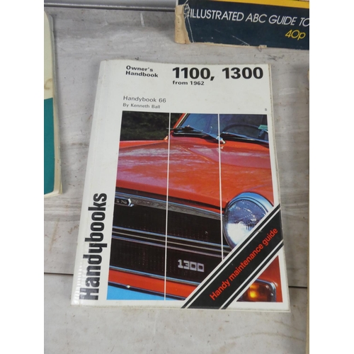 696 - A lot of vintage car hand books and more to include 1300 - 1100 MKII, MG 1100.