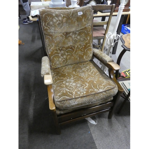 697 - A vintage/ retro sintique fireside chair.