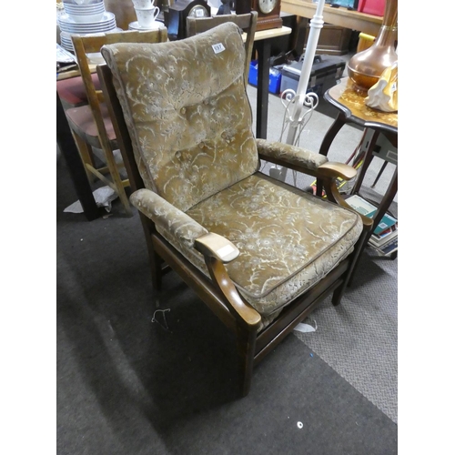 697 - A vintage/ retro sintique fireside chair.