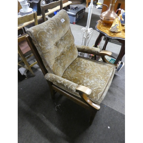 697 - A vintage/ retro sintique fireside chair.