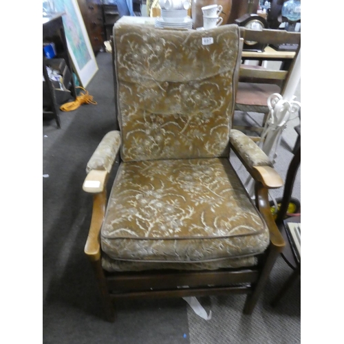 697 - A vintage/ retro sintique fireside chair.