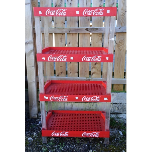 1156 - A Coca-Cola shelving unit.