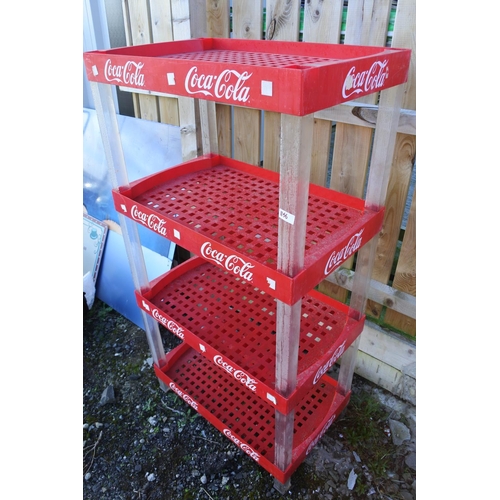 1156 - A Coca-Cola shelving unit.