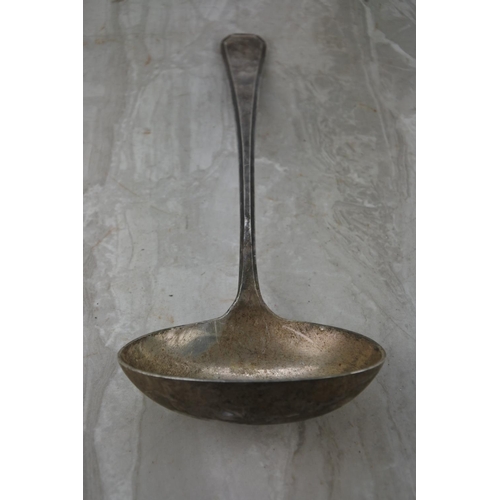 201 - A large antique silver plated soup ladle.