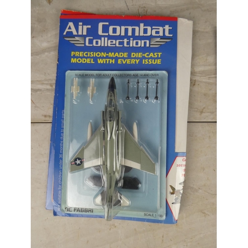 409 - A lot of Air Combat Collection magazines and other planes.