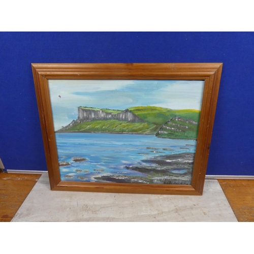 1045 - A framed painting of Fairhead Ballycastle.