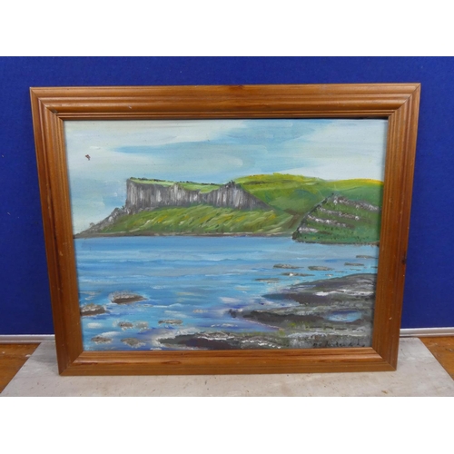 1045 - A framed painting of Fairhead Ballycastle.