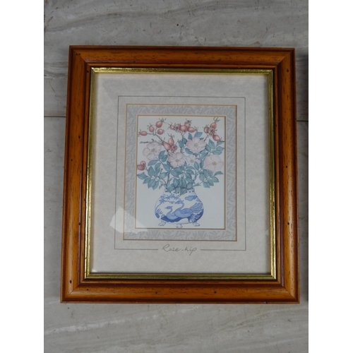 1046 - Two framed floral prints.