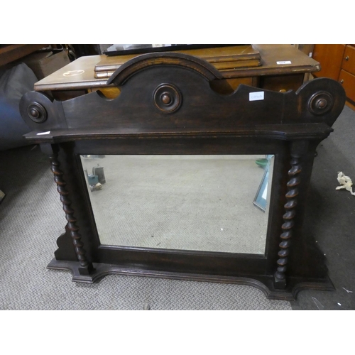 1090 - A large mantle mirror with barley twist detail.