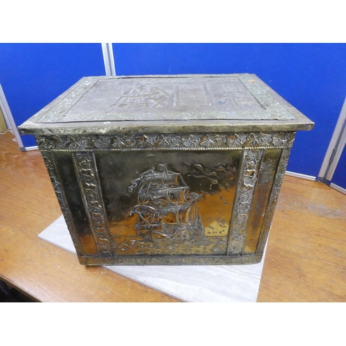 1110 - A large brass fireside box.