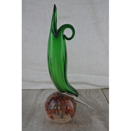 15 - An unusual and  stunning vintage glass paperweight with a mounted green glass vase.  Approx 28cm.