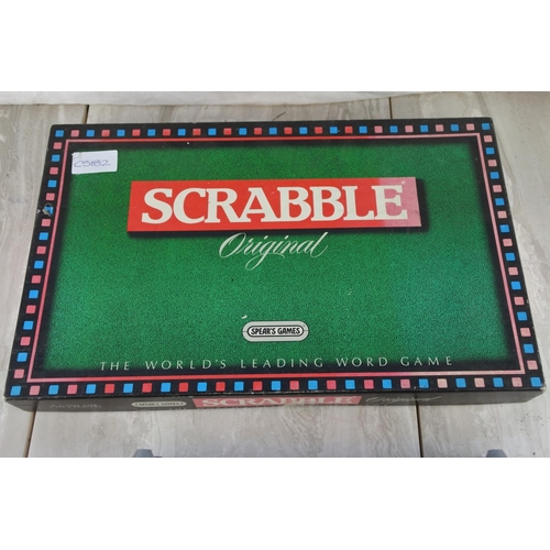 2 - A vintage scrabble board game, a cased poker set and more.