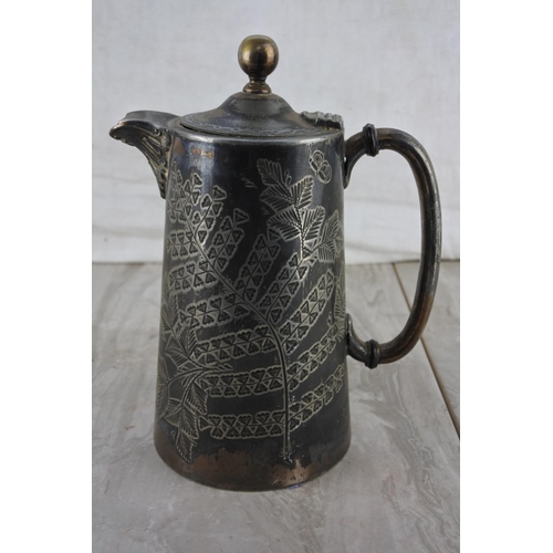 28 - An antique silver plated water pot.