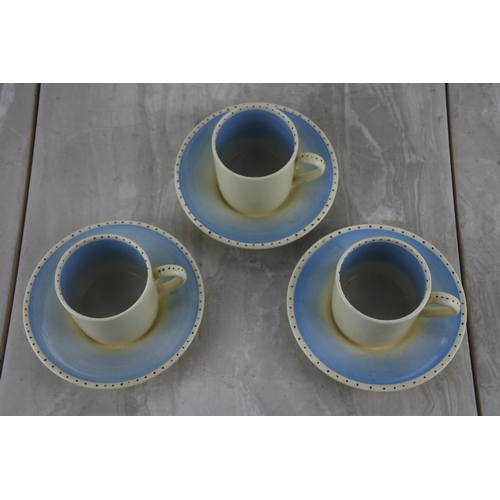 51 - Three vintage Susie Cooper coffee cups and saucers.