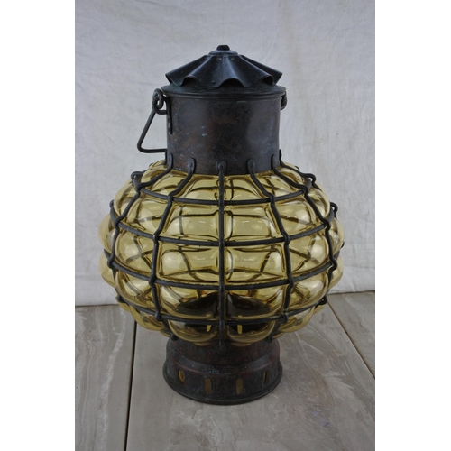 62 - A large stunning amber glass lantern  Approx 40cm.