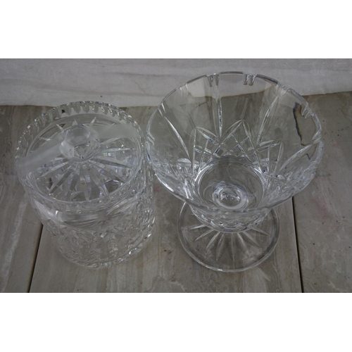 66 - A stunning Waterford Crystal biscuit barrel and a cut glass vase.