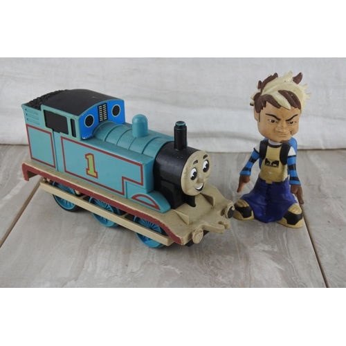 7 - A Thomas the Tank Engine train and  PunkRawk toy character.