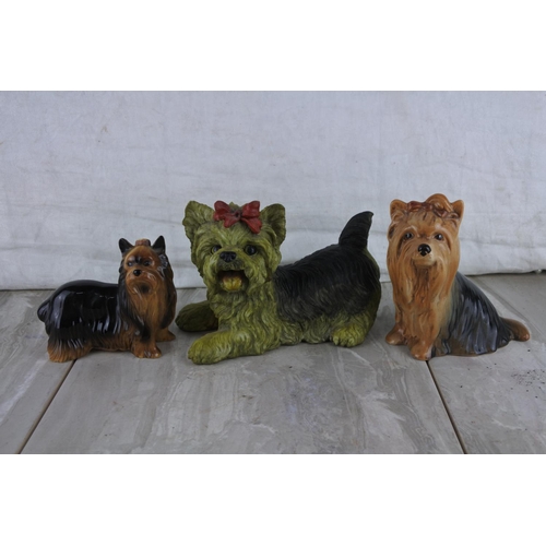 70 - A vintage Sylvac number 5027 Yorkshire Terrier sitting dog and two others.