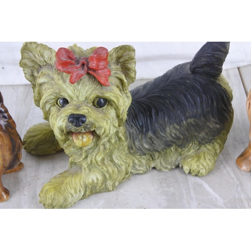 70 - A vintage Sylvac number 5027 Yorkshire Terrier sitting dog and two others.