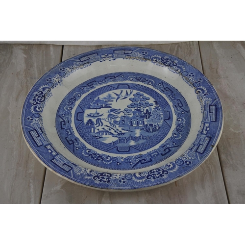 72 - A large antique Indian Tree patterned blue and white charger.  Approx 38cm dia.