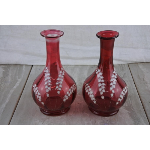 74 - A stunning pair of antique ruby vases with hand painted detail.  Approx 19cm.