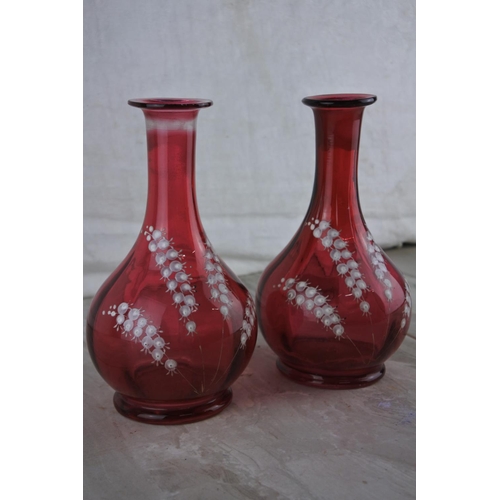 74 - A stunning pair of antique ruby vases with hand painted detail.  Approx 19cm.