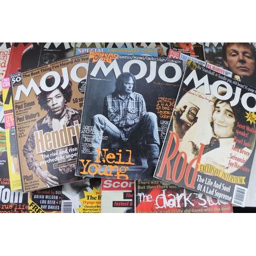 82 - A lot of Mojo magazines.