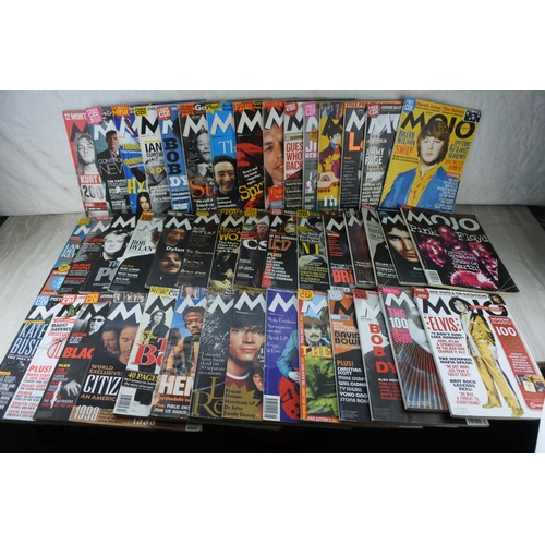 85 - A lot of Mojo magazines.