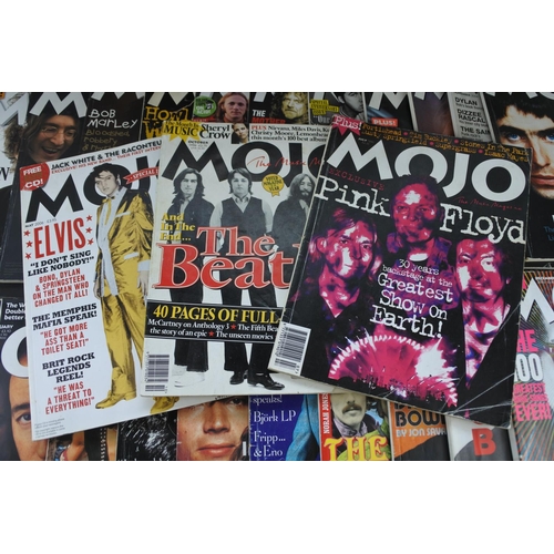 85 - A lot of Mojo magazines.