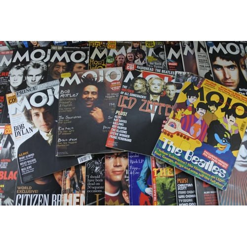 85 - A lot of Mojo magazines.