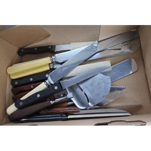 86 - A large lot of assorted cutlery.