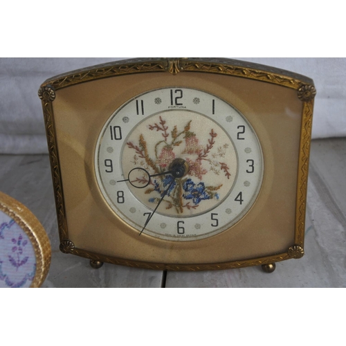 97 - A stunning vintage Fortuna mantle clock with tapestry detail and three others.