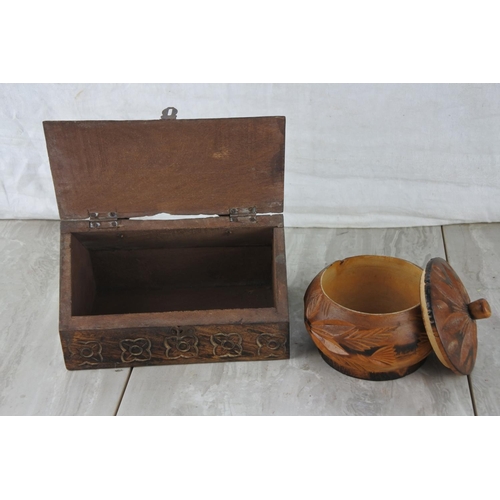 98 - A wooden carved jewellery box and a lidded pot.