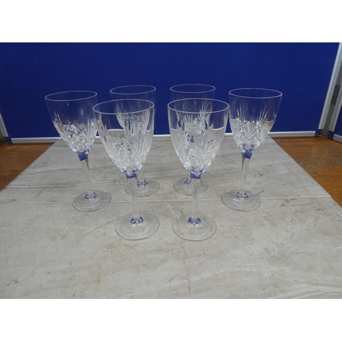 100 - A set of six crystal wine glasses.