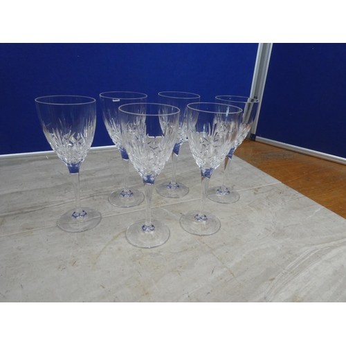 100 - A set of six crystal wine glasses.