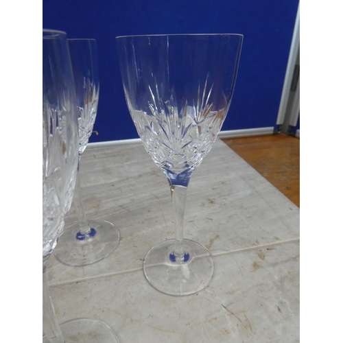 100 - A set of six crystal wine glasses.