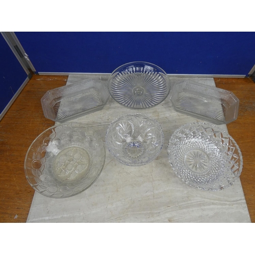 108 - An assortment of glass fruit bowls, trays and more.