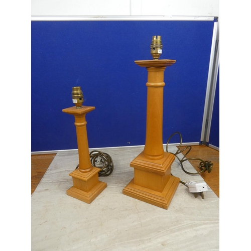 113 - Two wood based table lamp bases..  Tallest approx 47cm.