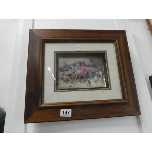 147 - A framed decoupage picture of a hunting scene.  Approx 42x37cm.