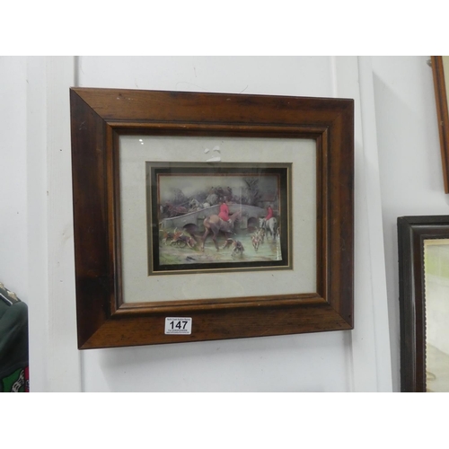 147 - A framed decoupage picture of a hunting scene.  Approx 42x37cm.