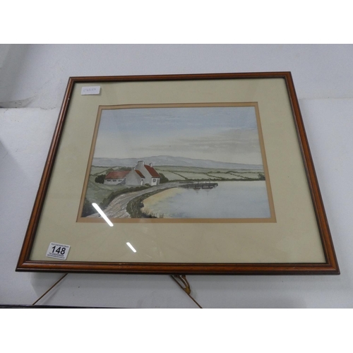 148 - A framed watercolour of a coastal scene signed.  Approx 55x46cm.