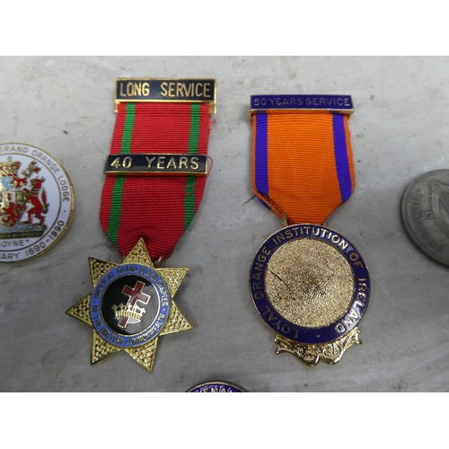 159 - An Orange Order 50 year service medal and more.